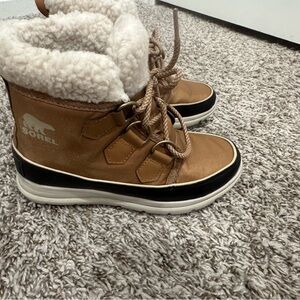Sorel Tan and Black Winter Boots